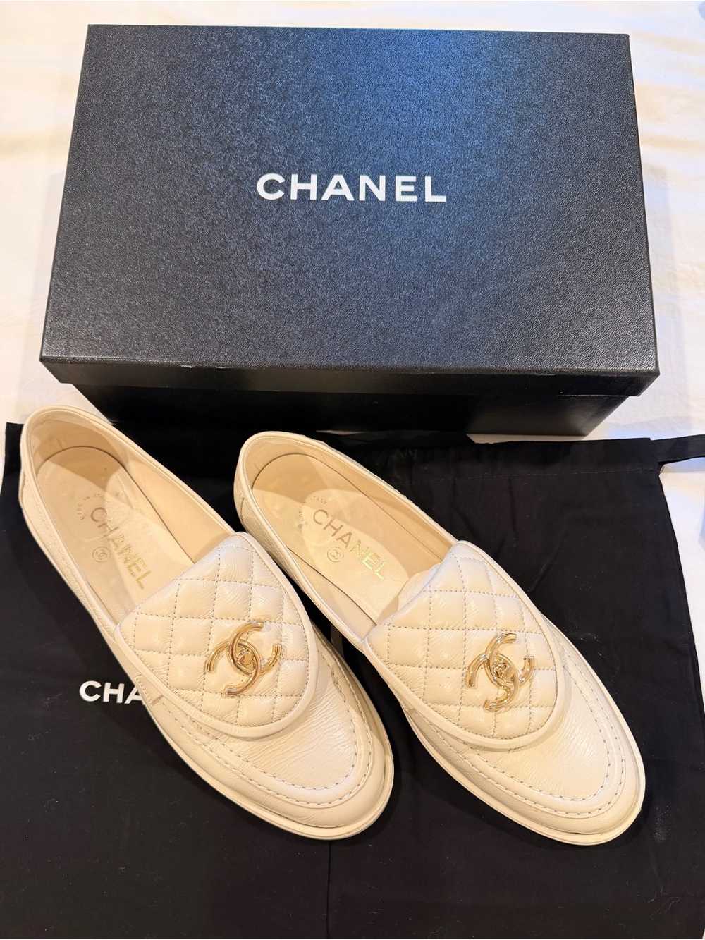 CHANEL Cream Quilted Leather Loafers with Gold CC Hardware
